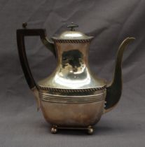 A late Victorian silver hot water pot, with a gadrooned body, London,