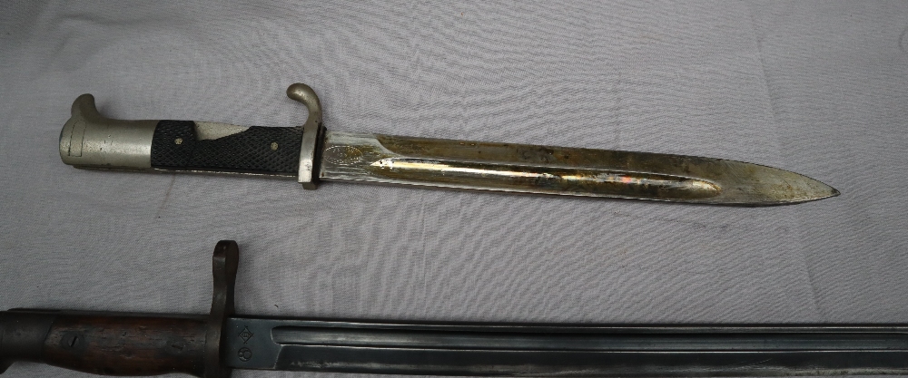 A French 1864 sabre bayonet and scabbard together with a Japanese Arisaka 1897 pattern bayonet and - Image 11 of 12