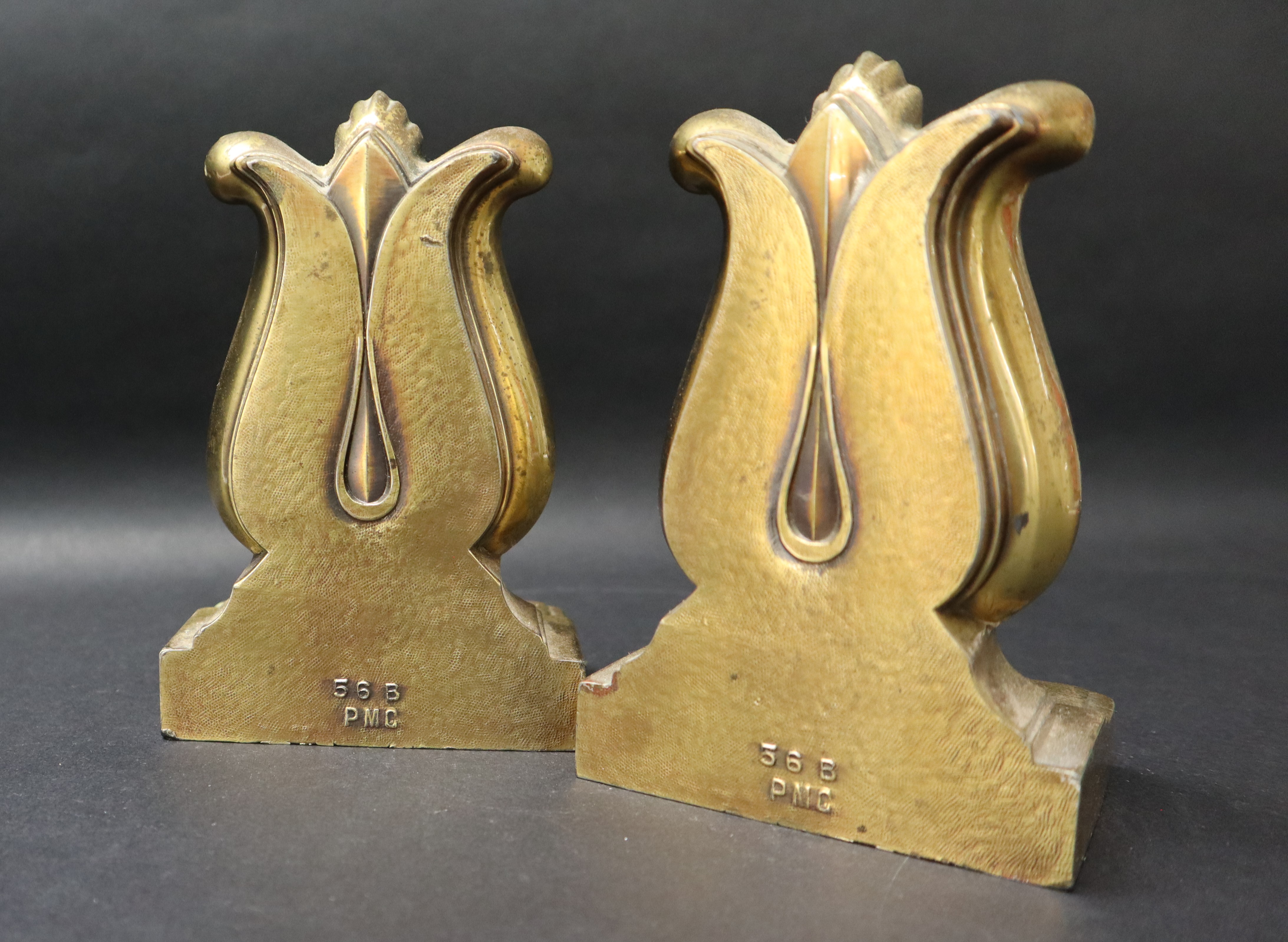 A pair of bronze book ends in the form of lyres on a rectangular base, moulded 56B PMC, - Image 4 of 6