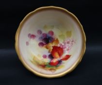 A Royal Worcester bowl of shaped circular form,