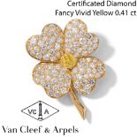 VAN CLEEF & ARPELS 'COSMOS' WHITE DIAMOND AND FANCY VIVID YELLOW DIAMOND FLOWER BROOCH