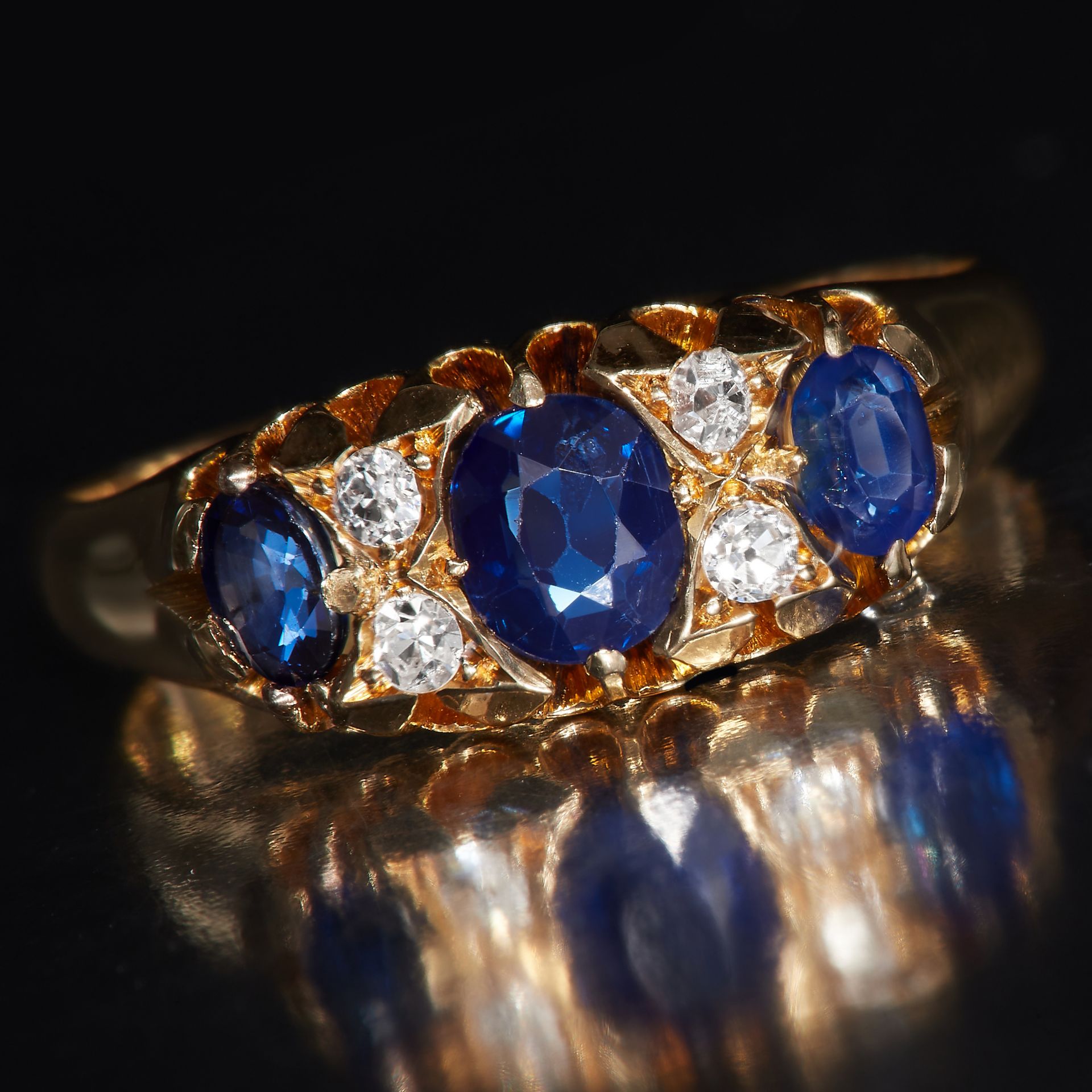 EDWARDIAN SAPPHIRE AND DIAMOND 5-STONE RING