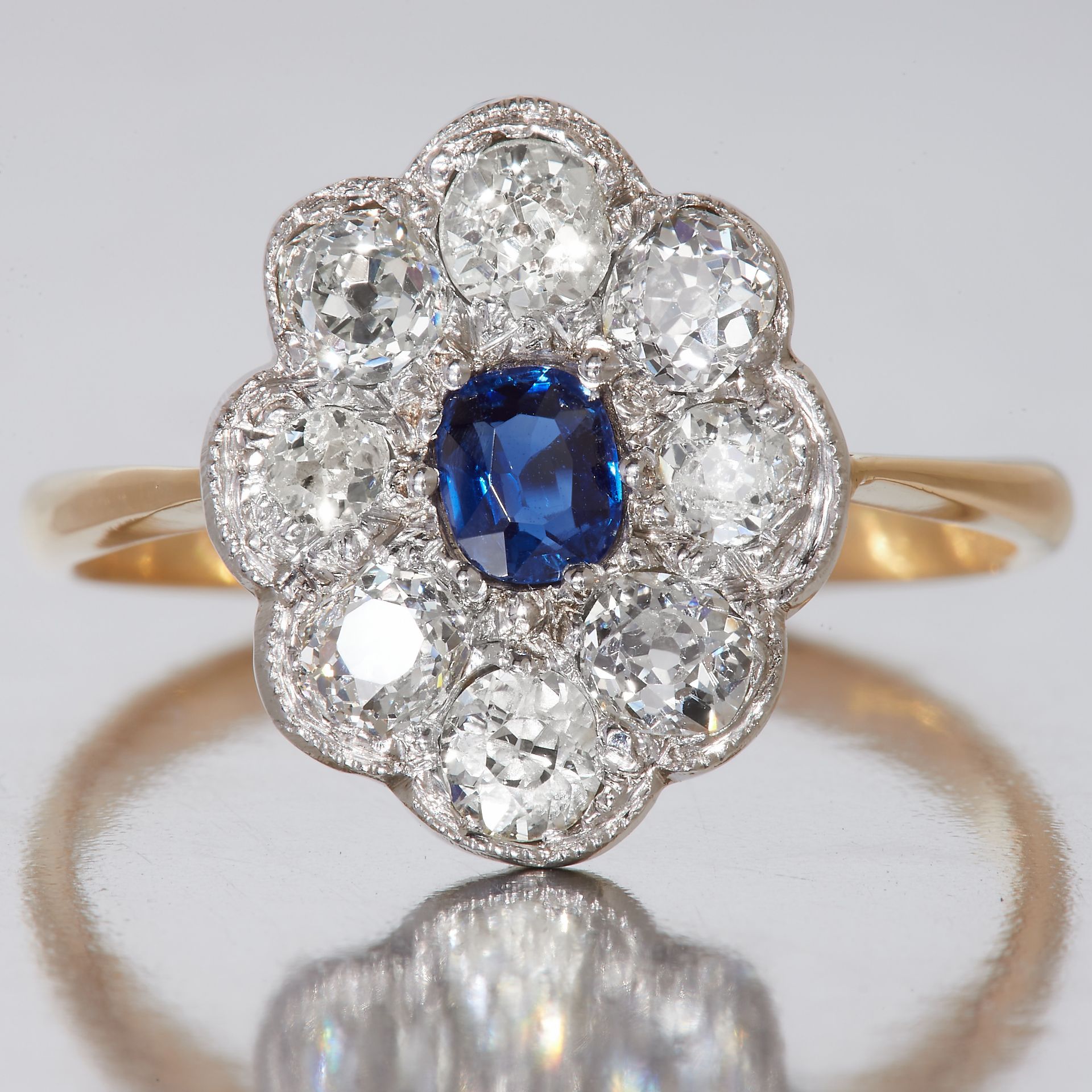 SAPPHIRE AND DIAMOND CLUSTER RING