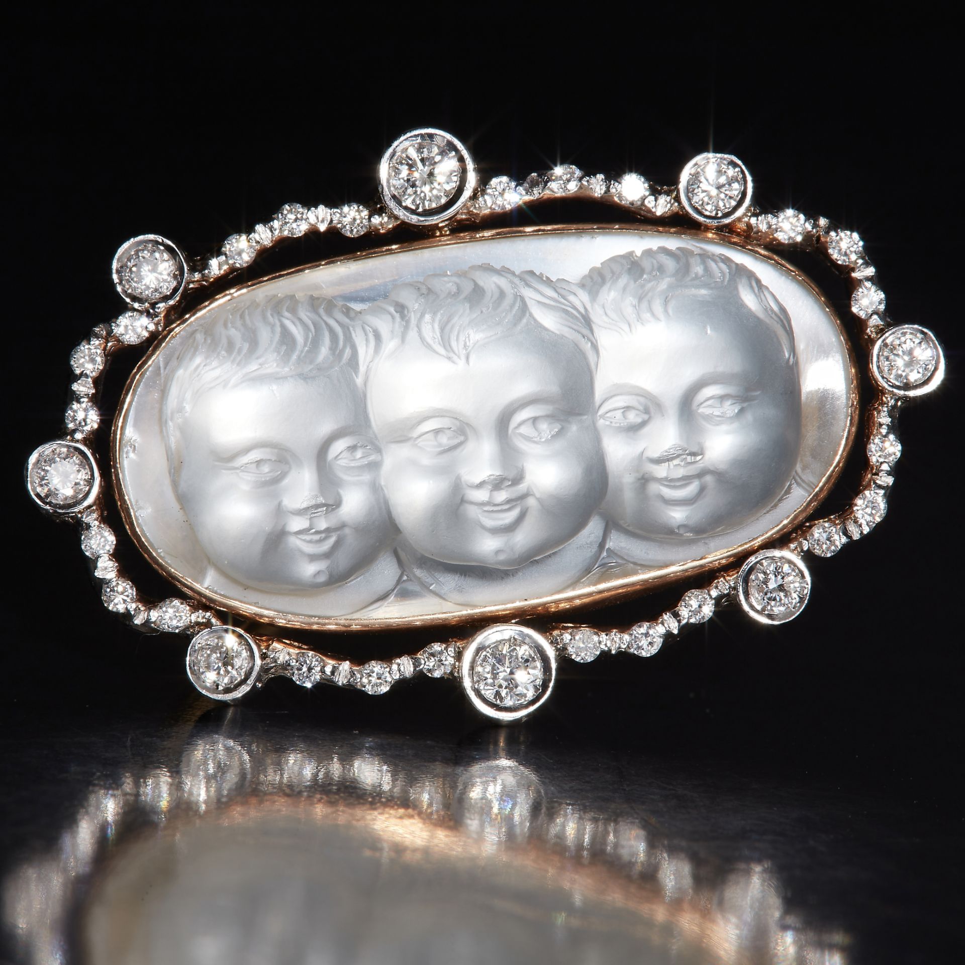 MAGNIFICENT VICTORIAN CARVED MOONSTONE AND DIAMOND BROOCH.