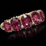 IMPRESSIVE FIVE STONE RUBY RING