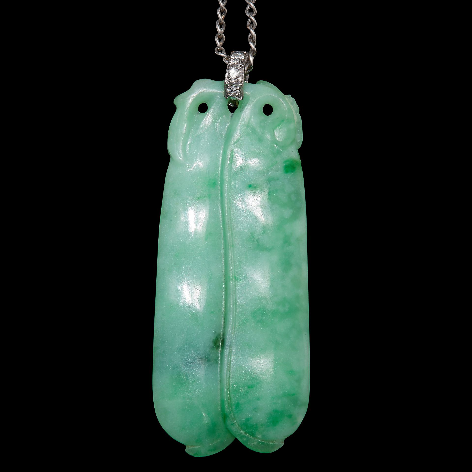 CARVED JADE PENDANT WITH DIAMONDS