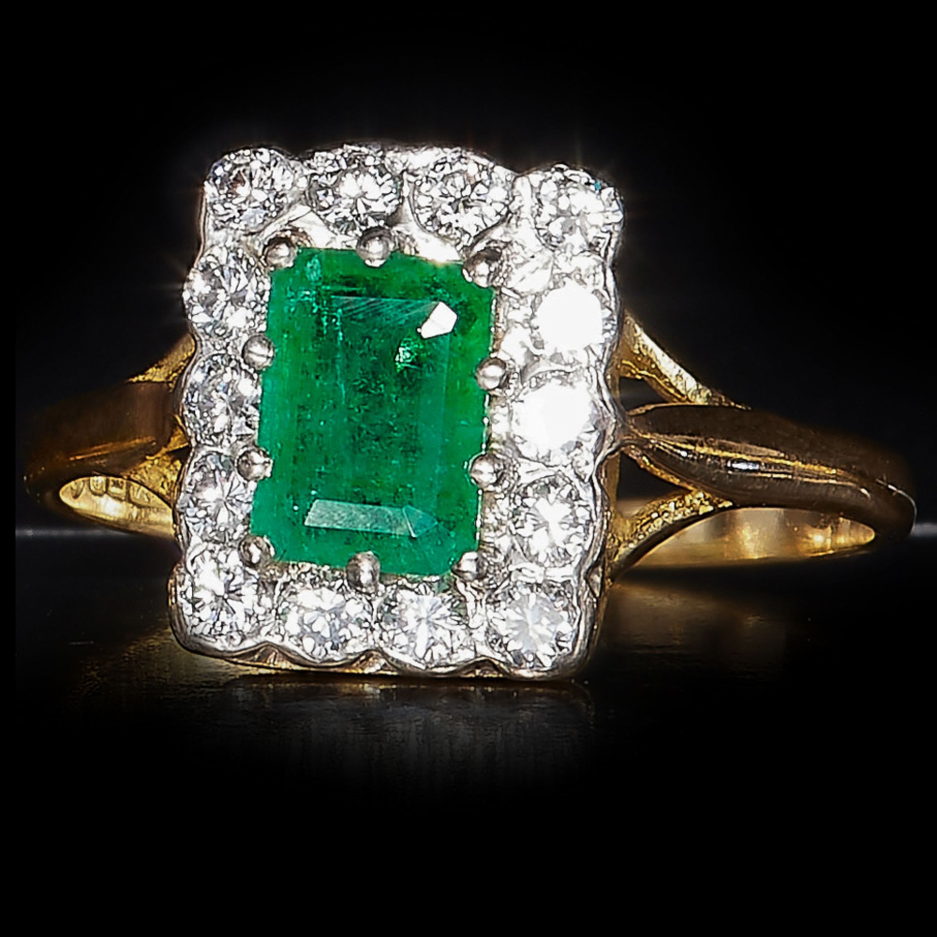18 CT GOLD EMERALD AND DIAMOND CLUSTER RING