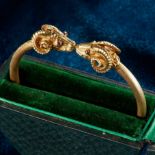 FINE DOUBLE RAMS HEAD GOLD BANGLE