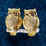 DIAMOND AND RUBY BROOCH, DEPICTING A PAIR OF OWLS,MADE BY WOLF & CO