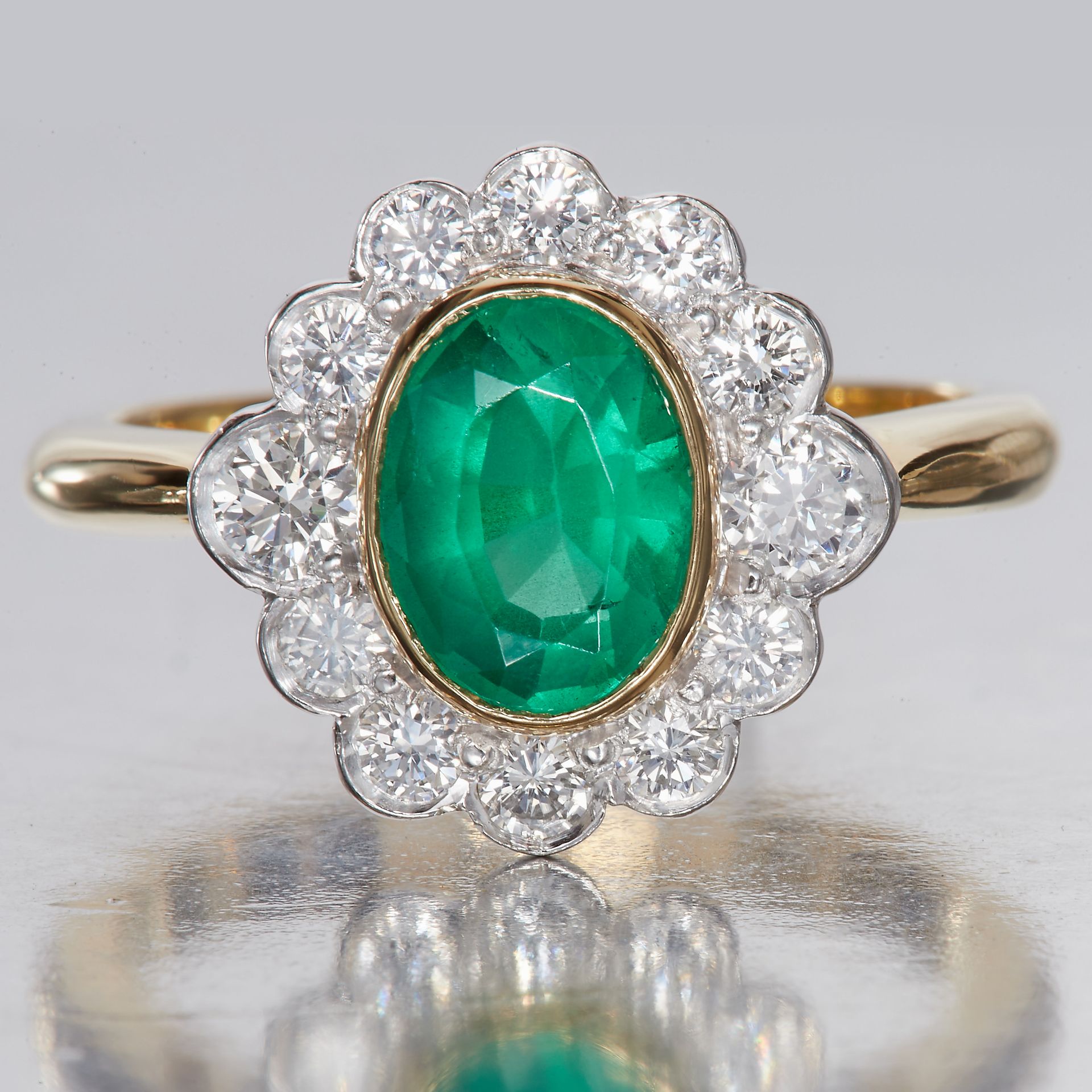 EMERALD AND DIAMOND CLUSTER RING