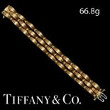 TIFFANY & CO, 'SIGNATURE SERIES' BEAUTIFUL 18 CT. GOLD. 3-ROW BRACELET