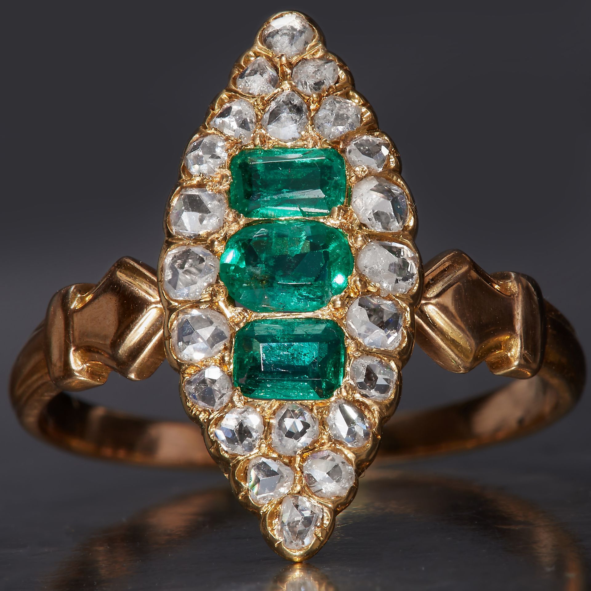 ANTIQUE EMERALD AND DIAMOND MARQUISE SHAPED RING