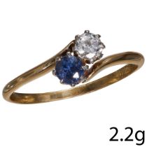 SAPPHIRE AND DIAMOND CROSSOVER RING.