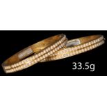 FINE AND RARE PAIR OF VICTORIAN DOUBLE ROW PEARL DOUBLE HINGED BANGLES