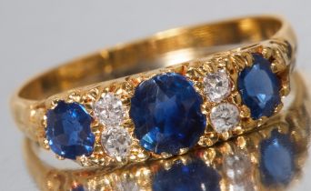 EDWARDIAN SAPPHIRE AND DIAMOND SEVEN STONE RING