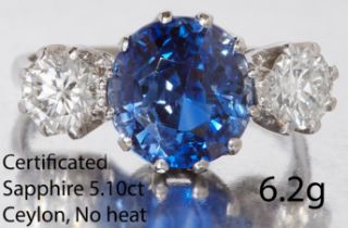 CERTIFICATED CEYLON NO HEAT SAPPHIRE, AND DIAMOND THREE STONE RING.