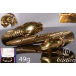 CARTIER, PANTHERE TRICOLOR GOLD PANTHERE SPRUNG BANGLE
