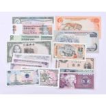 A group of banknotes from Asia