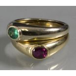 Doppelring mit Smaragd und Rubin / A double and mouvable 18ct gold ring with ruby and emerald