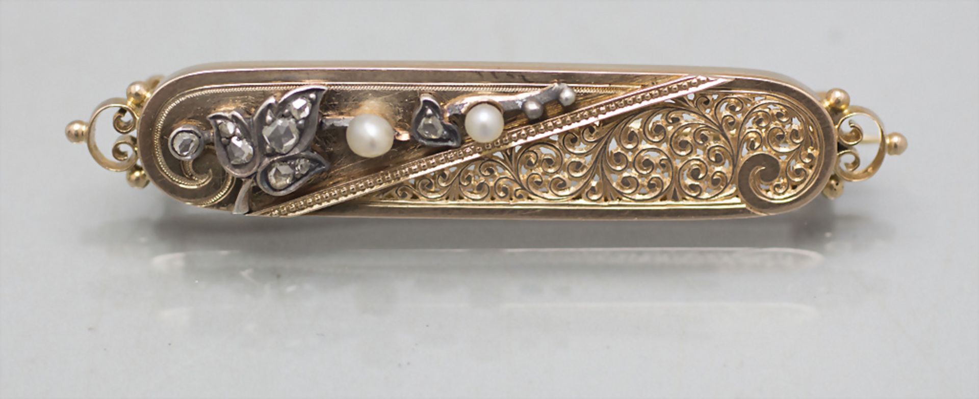 Brosche mit Diamanten und Saatperlen / A 14 ct gold brooch with diamonds and pearls