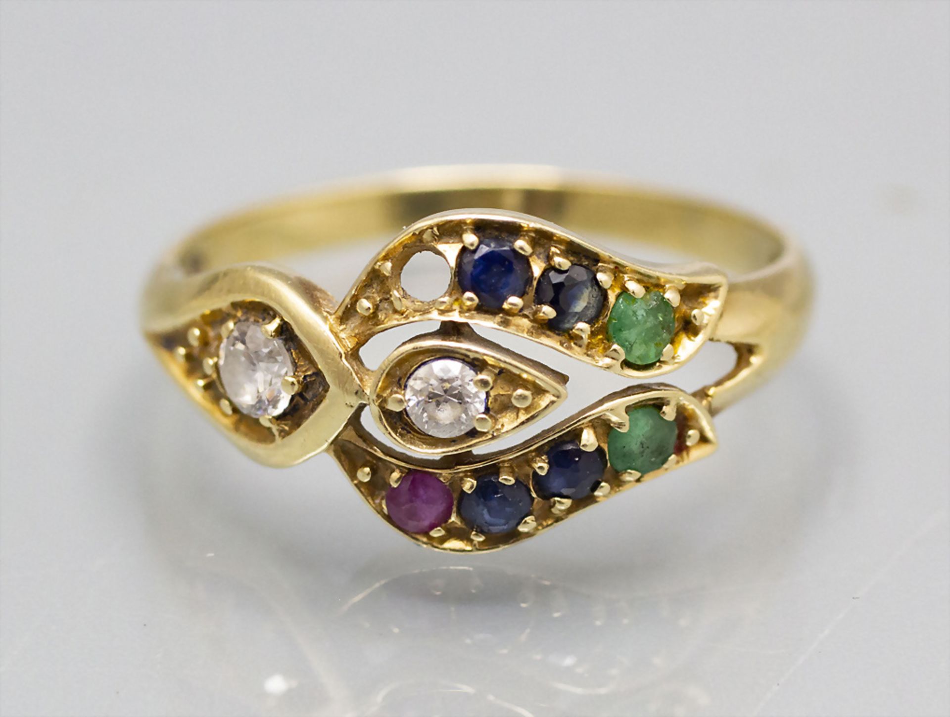 Damenring / A ladies 14 ct gold ring with diamonds, sapphires, emeralds, ruby