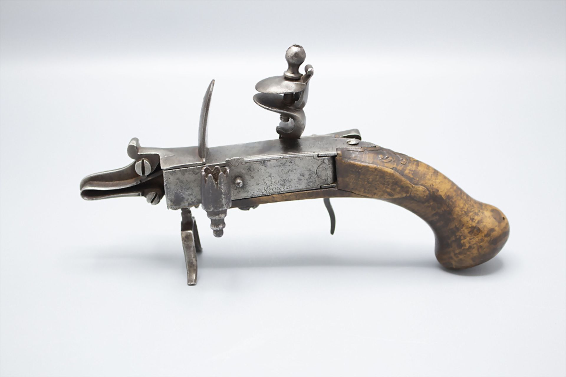 Seltenes Steinschloss-Tischfeuerzeug / A rare flintlock tinder lighter, England, 18. Jh.