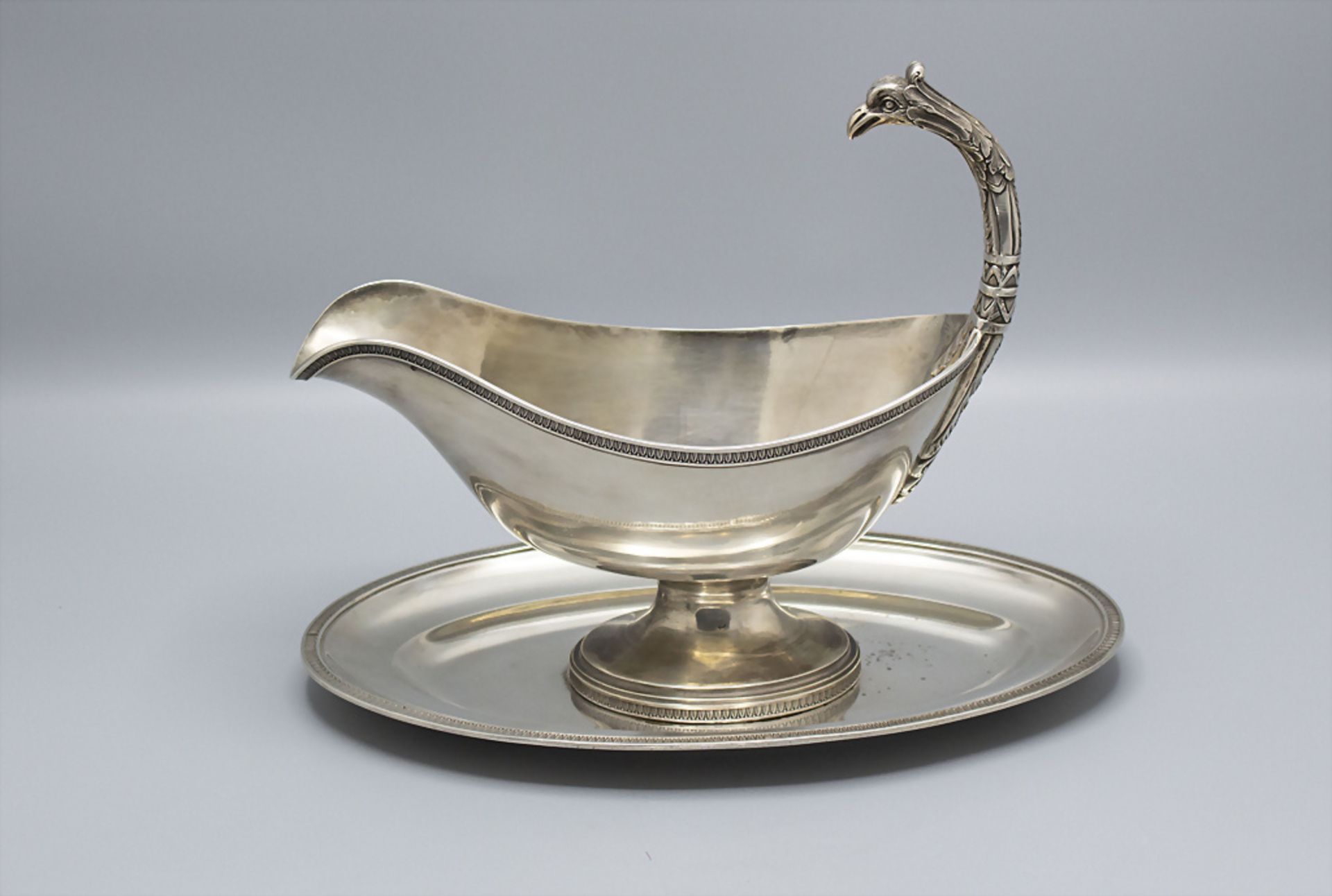 Sauciere mit Adlerkopf / A silver gavy boat with an eagle head shaped handle, Louis Coignet, ...