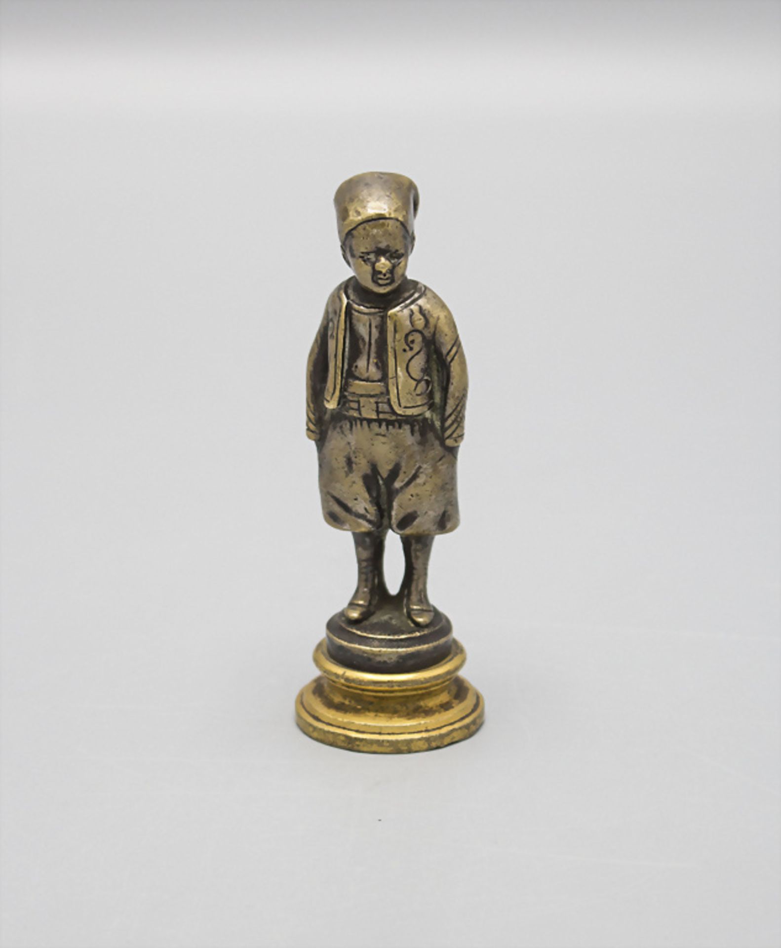 Miniatur Bronzefigur 'junger Orientale mit Schwert' als Petschaft / A miniature bronze seal ...
