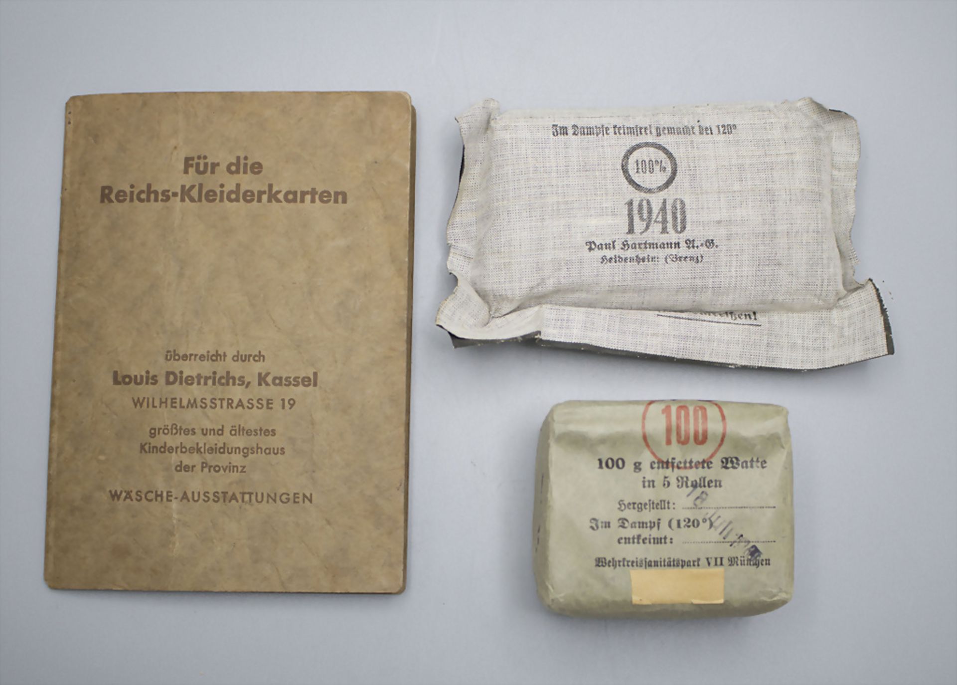 Verbandsutensilien, Watte und Kleiderkarte / Bandages, cotton and a ration cardfrom World War ...