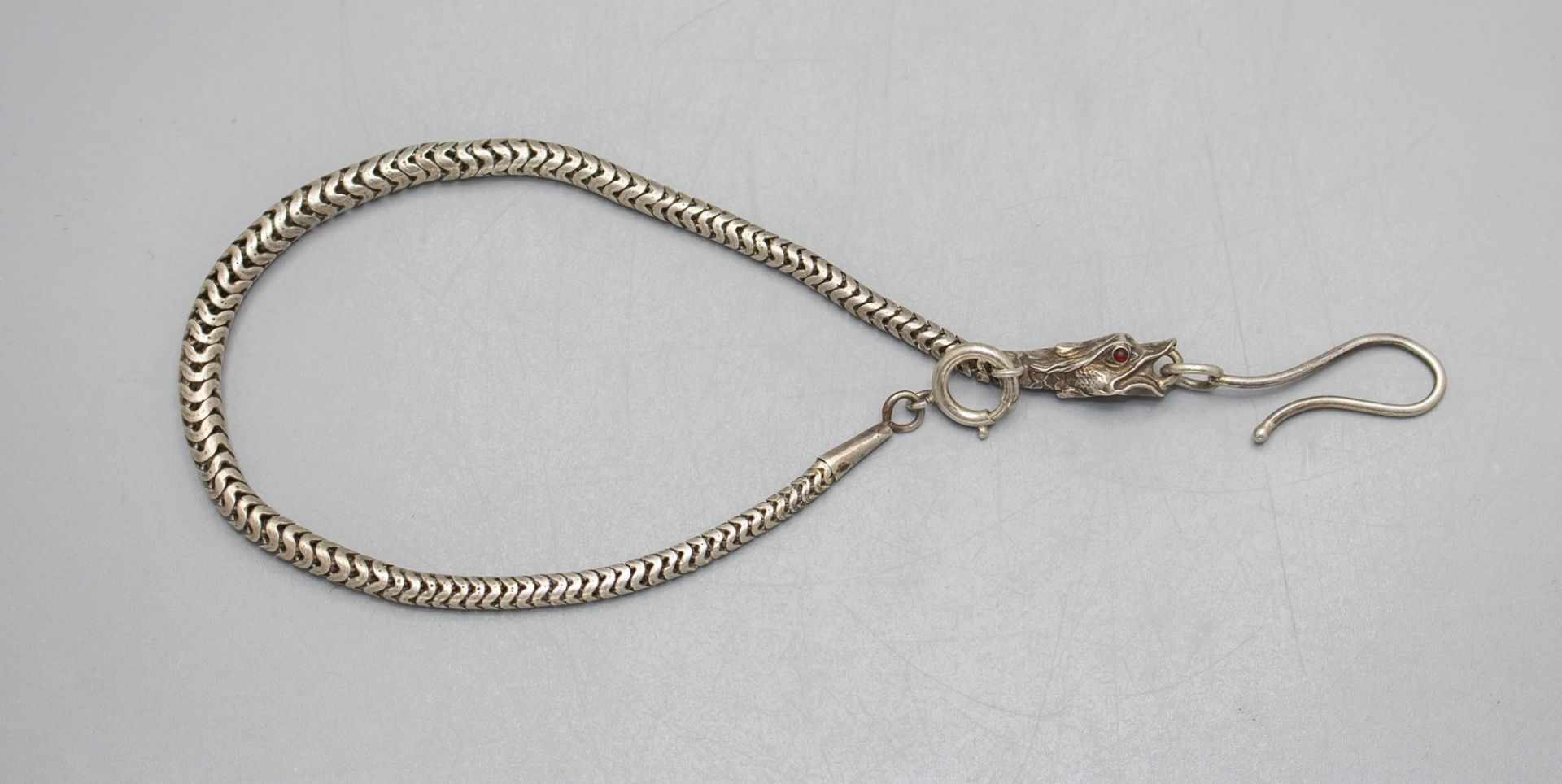 Schlangen-Armband/Kette/Chatelaine / A silver snake bracelet/chain, um 1900