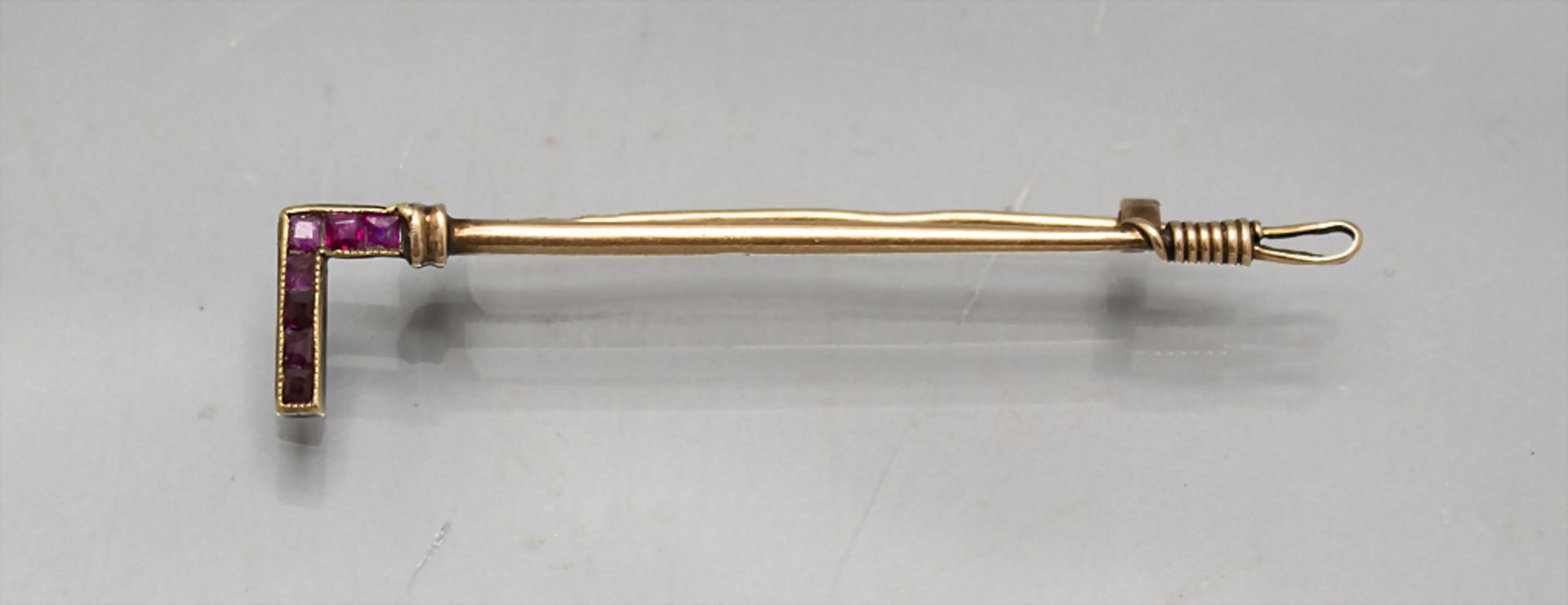 Goldbrosche mit Rubinen / A 14 ct gold brooch with rubies