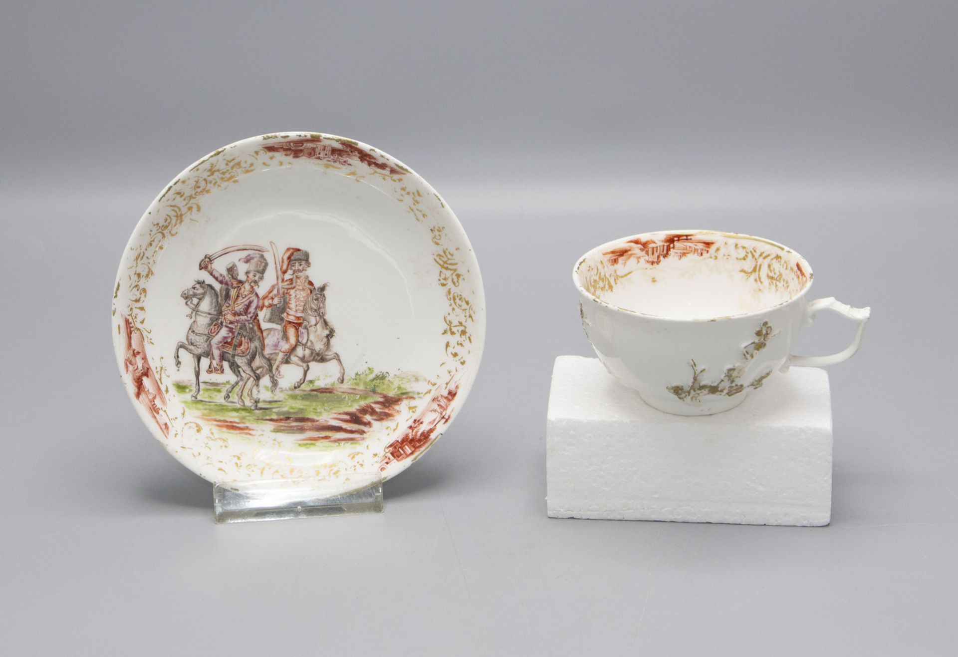 Frühe Teetasse mit UT 'Husarenreiter' / An early tea cup and saucer with 'Hussar riders', ...