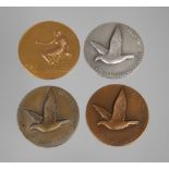 Vier Medaillen Taubenzucht