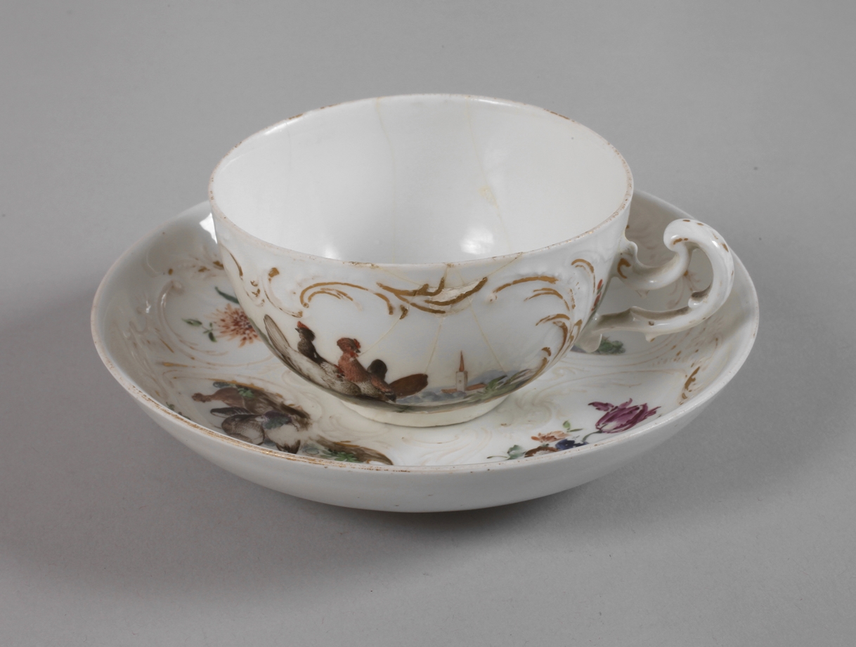 Meissen tea cup with saucer painted with birds