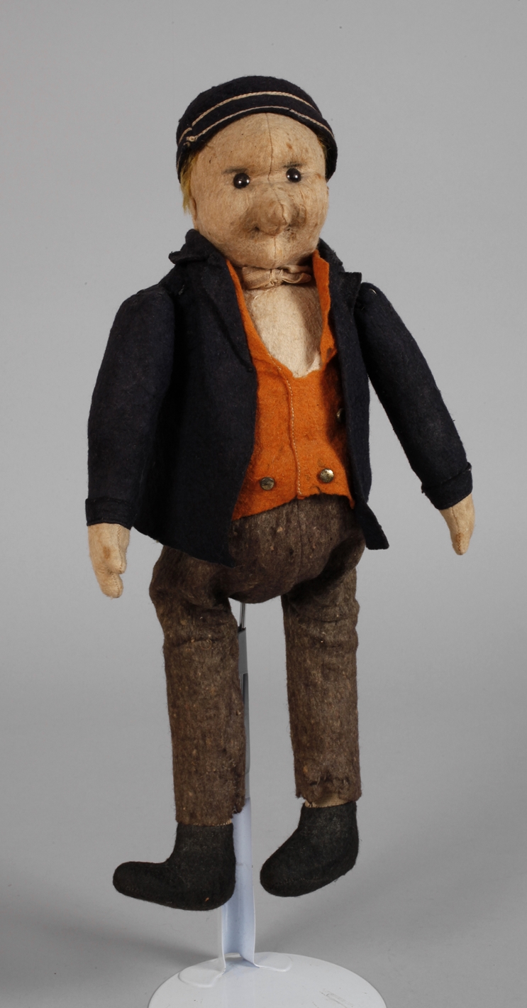 Felt head doll as a farmer