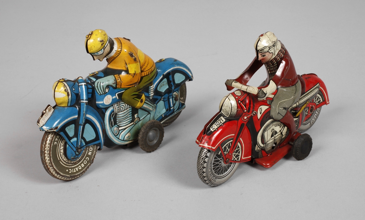 Two tin toy motorbikes