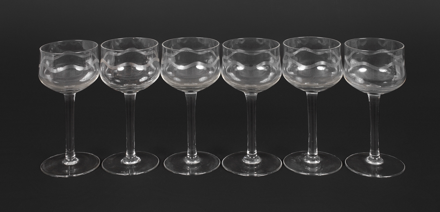 Six wine glasses with wavy decoration