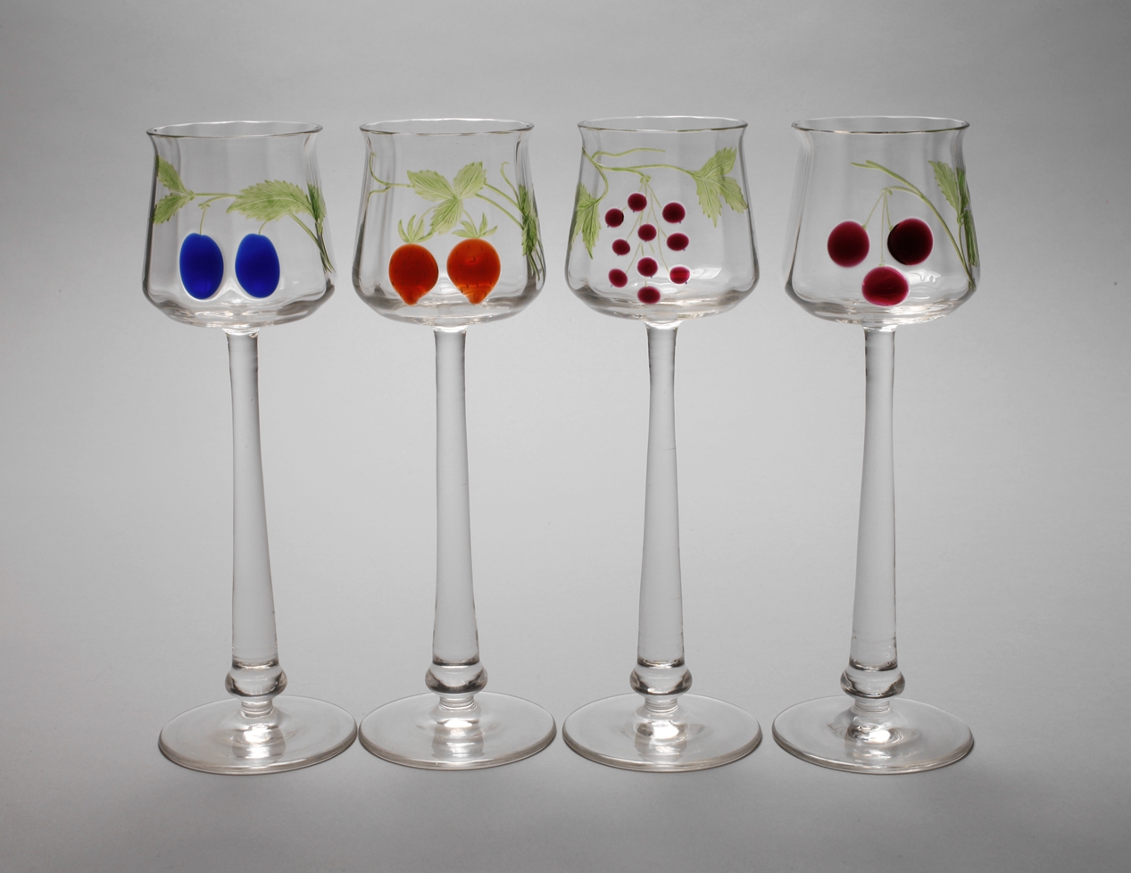 Four stemware with fused fruits