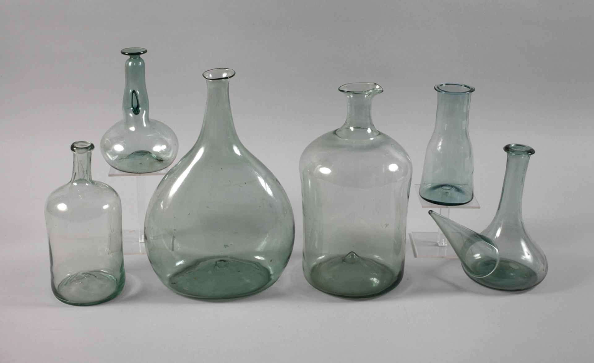 Six historical glass vessels