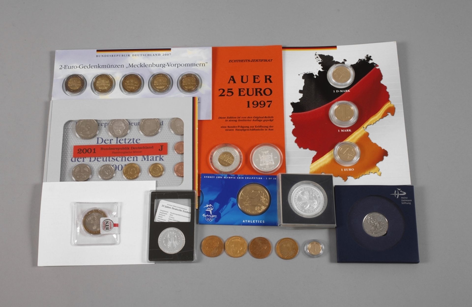 Items of commemorative coins and medals