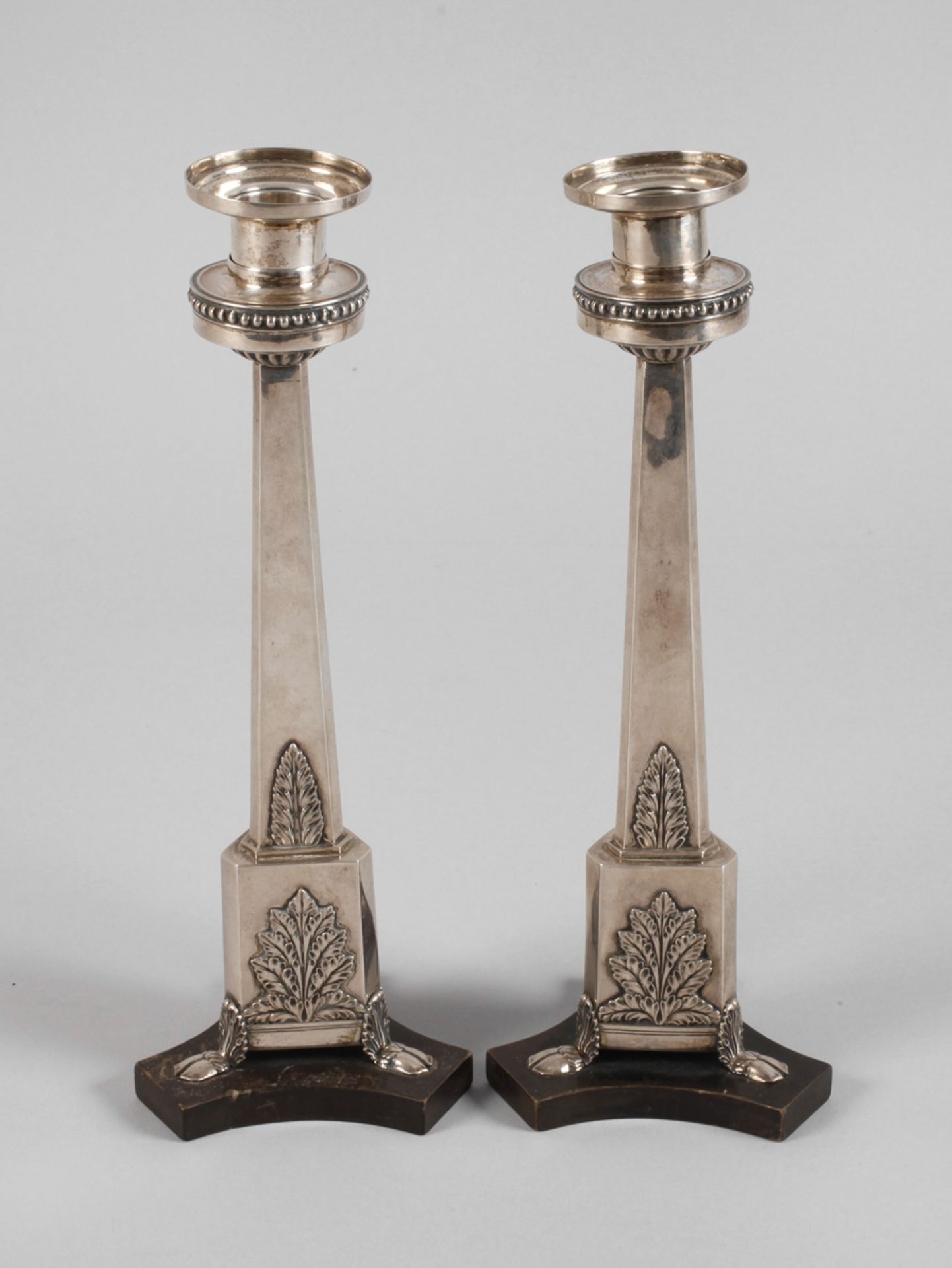 Pair of Empire silver candlesticks
