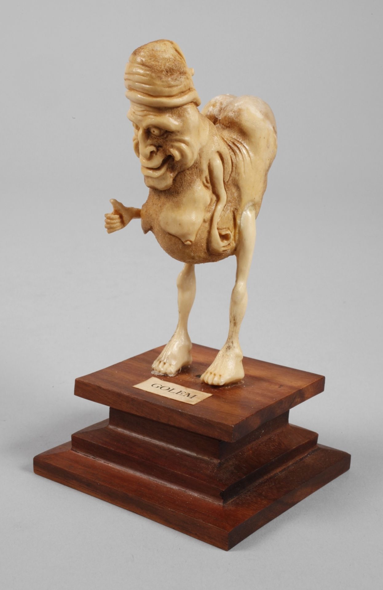 Figural horn carving