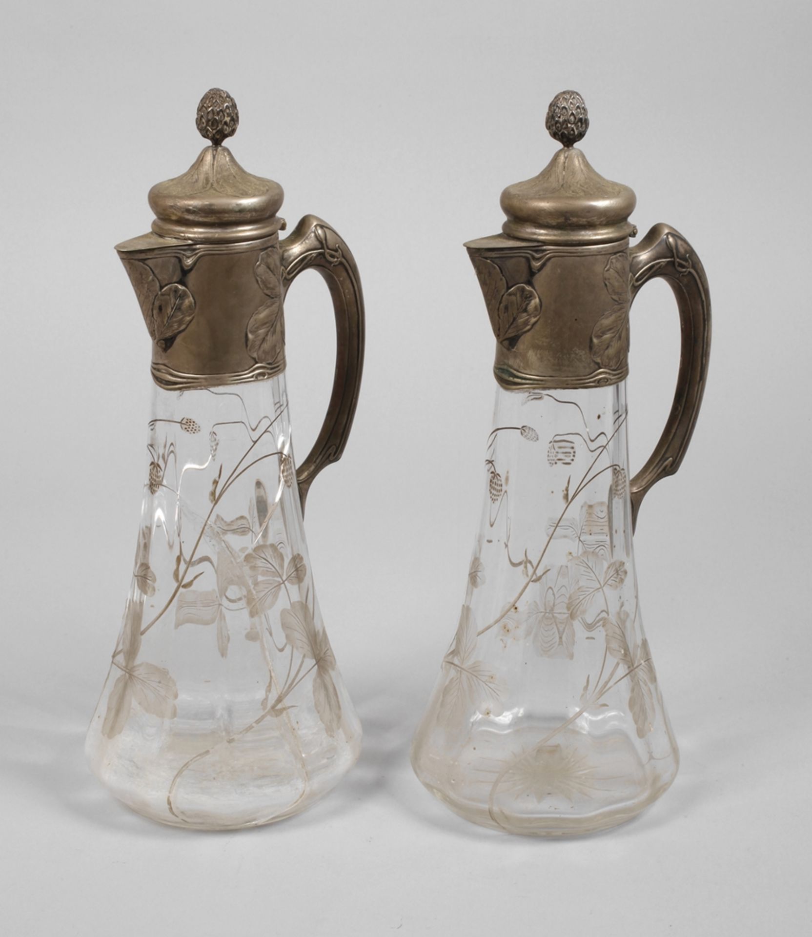 Two carafes with silver mount