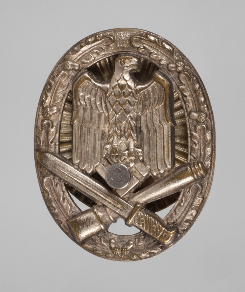 General storm badge with screw plate