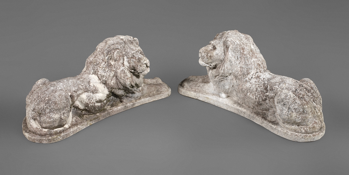 Pair of garden figures lying lions