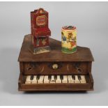 Two money boxes and children's grand piano