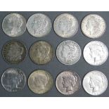 12 Silber Dollar Münzen. 1923 und älter.