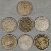 9 Münzen / Medaillen wohl China alt.