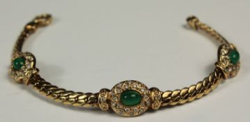 Armband Gold 585 mit 0,65 Karat Diamanten 3 Smaragde.