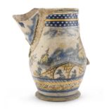 REMAINS OF A MAJOLICA JUG PROBABLY CALTAGIRONE EARLY 19TH CENTURY
